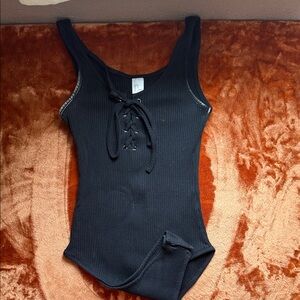 Black Ribbed Bodysuit with Lace-Up Front